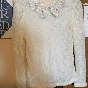 White shirt with pearls